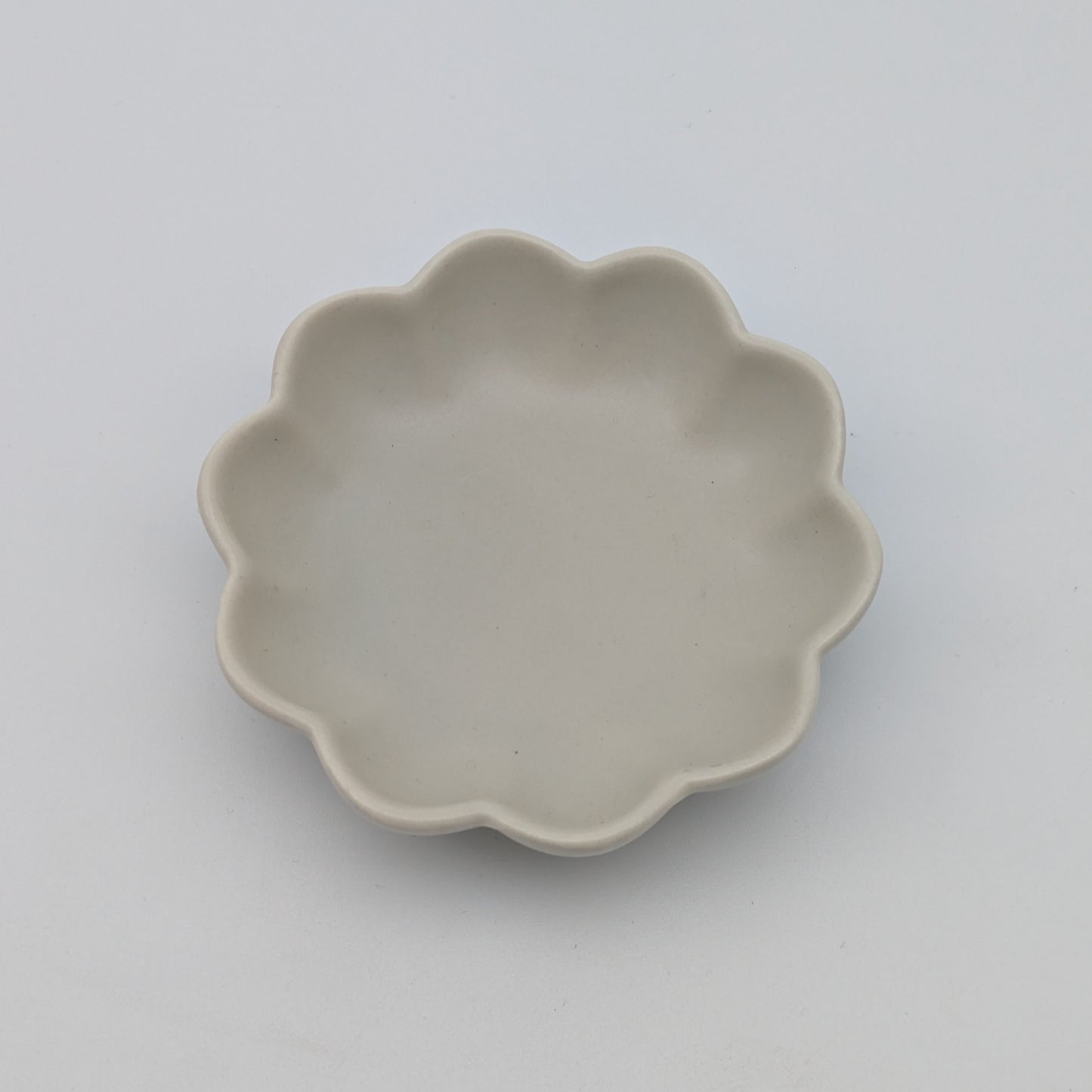 Untersetzer Blüte beige